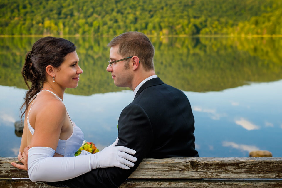 Wedding couple on a bench at Mont Saint-Hilaire lake