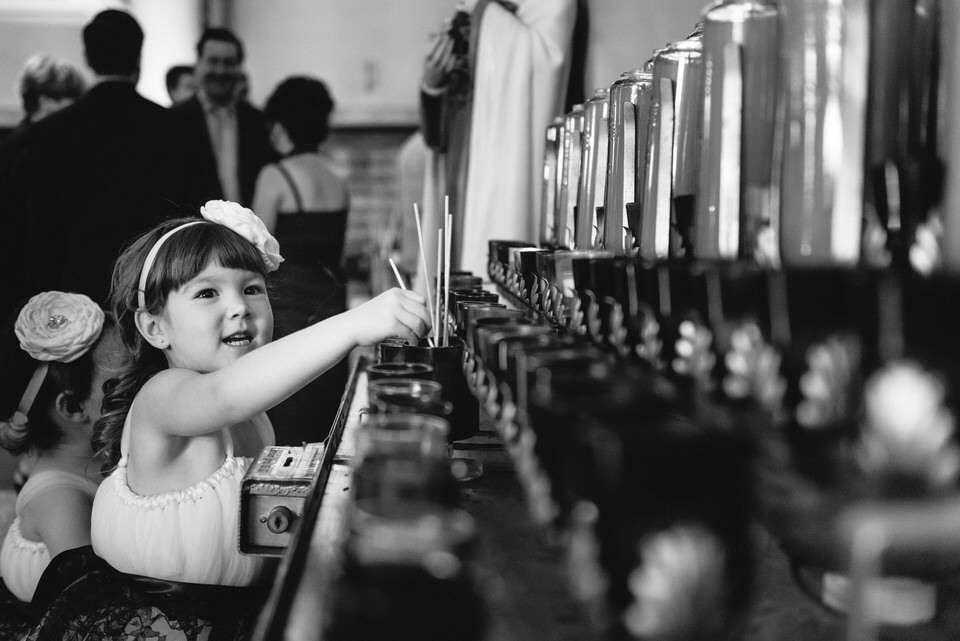 Child playing with candles at Catholic church