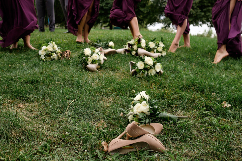 Bridesmaids shoes lying in the grass