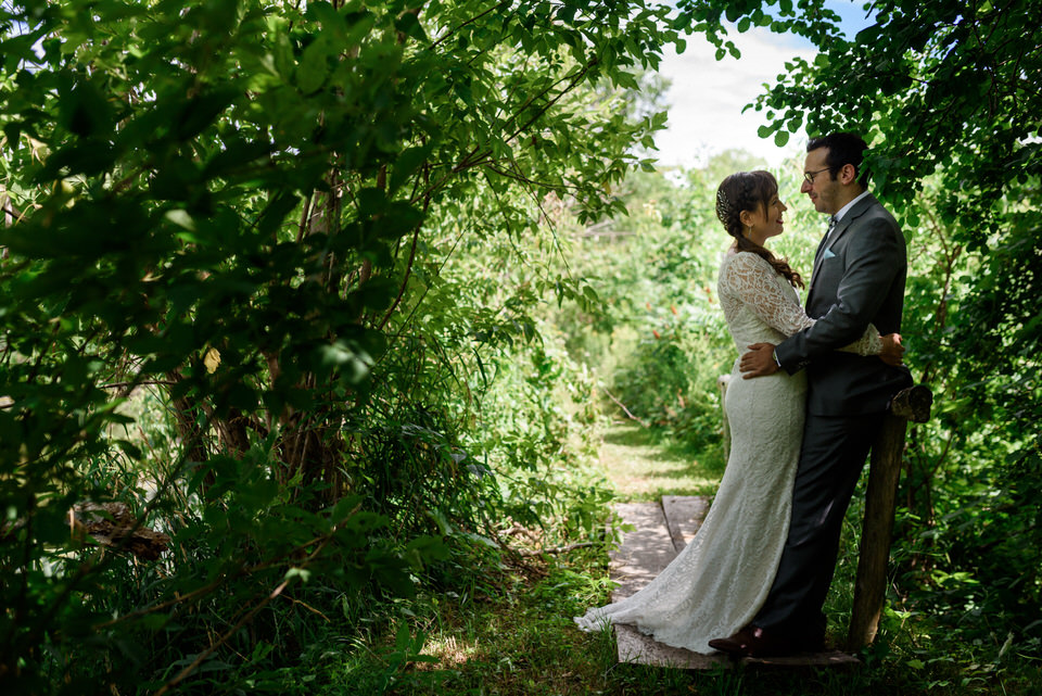 Wedding portrait surrounded by greenery at Auberge des Gallant