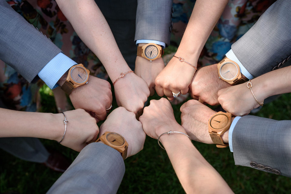 Matching wooden watches and knot metal bracelets for wedding party