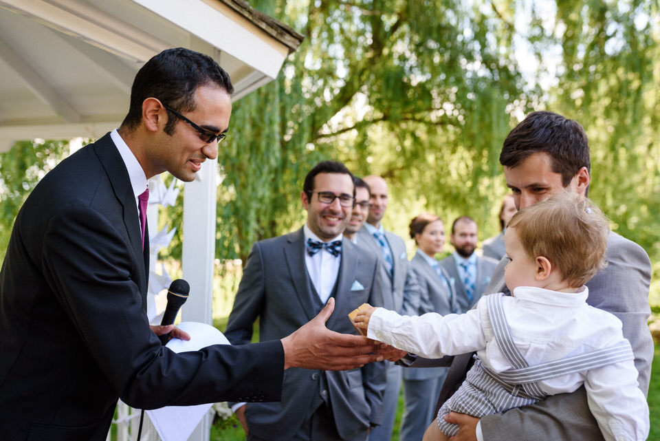 Officiant greeting the ring bearer