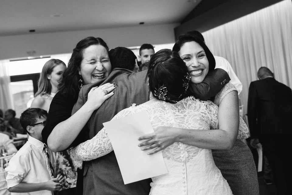 Hugs from cousins for the bride