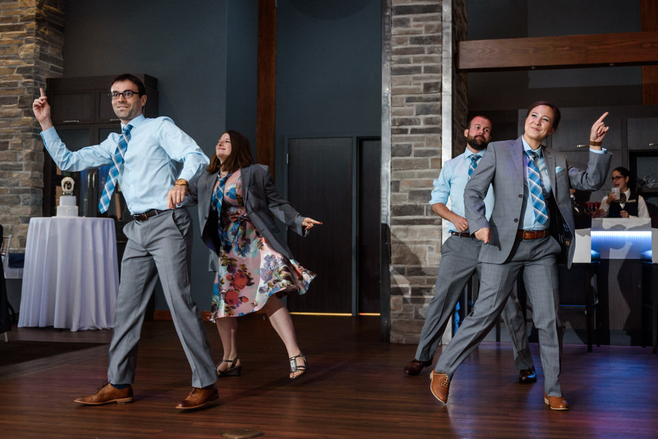 Bridal party performing A Millions Ways to be Cruel dance by OK GO