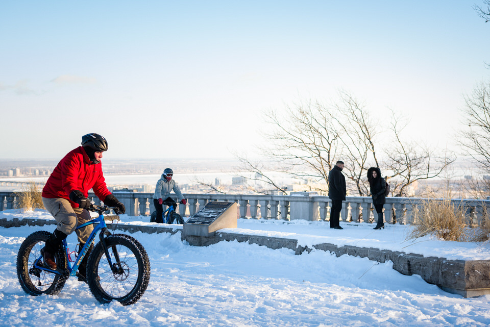 Man riding fat bike on snow at Mount Royal