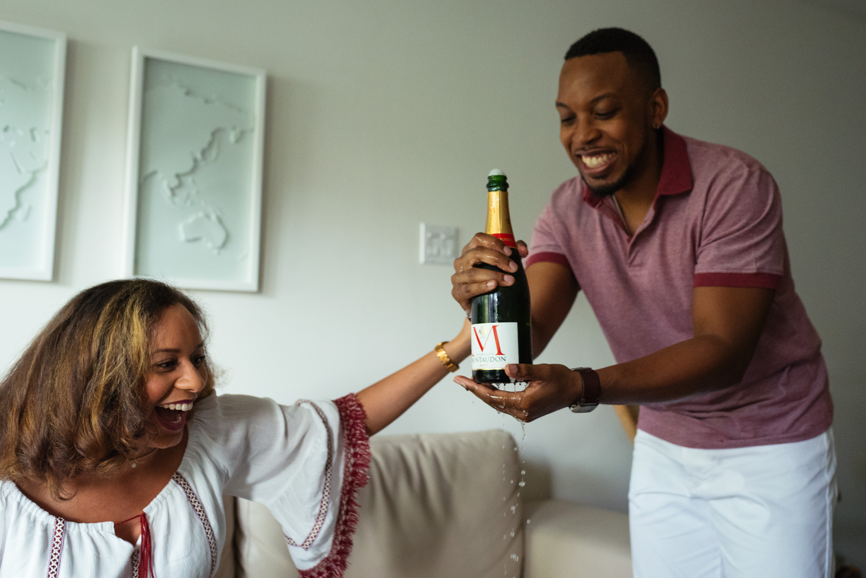 Popped champagne dripping during engagement photos